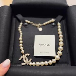 CHANEL Pearl Necklace with Sparkling Silver Logo
